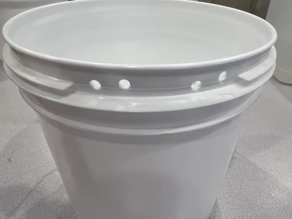 gallon bucket with 4 holes drilled